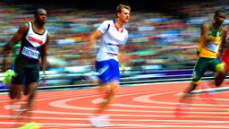 Christophe Lemaitre (M.) bei den Olympischen Spielen 2012 in London. © picture alliance / empics Foto: EMPICS Sport