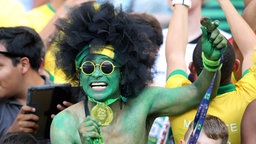 Ein brasilianischer Fußballfan.  © Imago/BPI