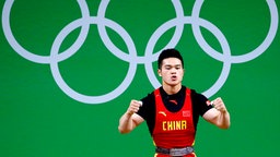 Chinas Gewichtheber Shi Zhiyong © dpa Foto: Larry W. Smith