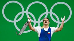 Der iranische Gewichtheber Sohrab Moradi © dpa - Bildfunk Foto: Larry W. Smith