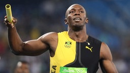 Usain Bolt im 4x100m Staffel-Finale der Männer  Foto: Michael Kappeler