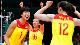Jubelnde chinesische Volleyball-Spielerinnen © dpa - Bildfunk Foto: Michael Reynolds