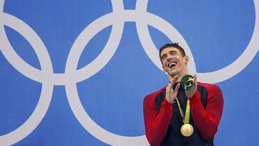 US-Schwimmer Michael Phelps lacht. © DPA Picture Alliance Foto: Patrick B. Kraemer