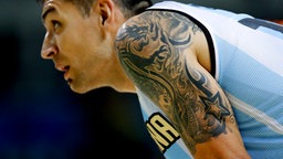 Der argentinische Basketballer Carlos Delfino mit Tattoos © picture alliance / dpa Foto: Jorge Zapata
