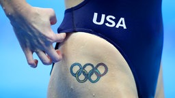 Eine US-amerikanische Schwimmerin mit einem Tattoo © picture alliance / empics Foto: Mike Egerton