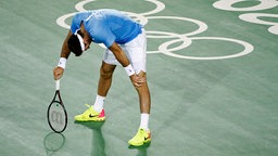 Der argentinische Tennisspieler Juan Martin del Potro erschöpft © dpa Foto: Michael Reynolds