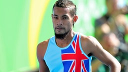 100-m-Sprinter Etimoni Timuani aus Tuvalu © dpa Foto: Michael Kappeler