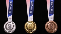 Das Medaillen der Olympischen Sommerspiele 2020 in Tokio. © picture alliance Foto: Tokyo 2020/Cover Images