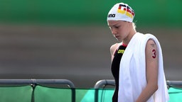 Finnia Wunram vor dem Start des Freiwasserschwimmens bei den Olympischen Spielen in Tokio. © dpa picture alliance Foto: Oliver Weiken