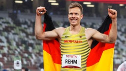 Der deutsche Para-Athlet Markus Rehm bejubelt Gold. © IMAGO / Beautiful Sports